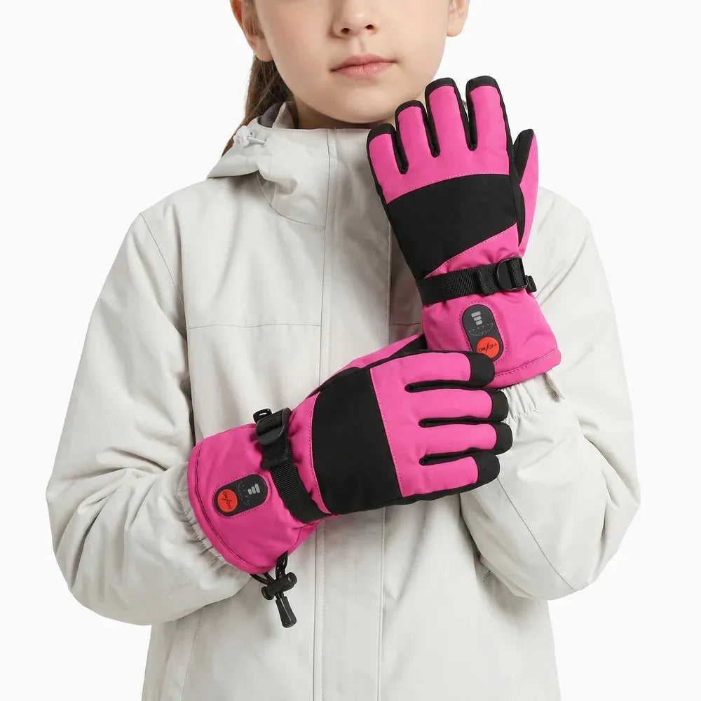 Gants chauffants enfant roses SAVIOR HEAT SKGL01FP portés par un modèle