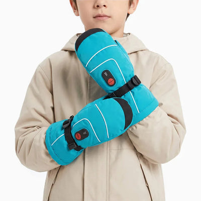 Moufles chauffantes enfant bleues SAVIOR HEAT SKGL01MB portées par un modèle